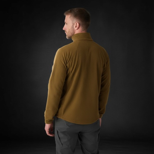 Helikon-Tex Alpha Tactical jacket detail — arm patches and zippered pockets